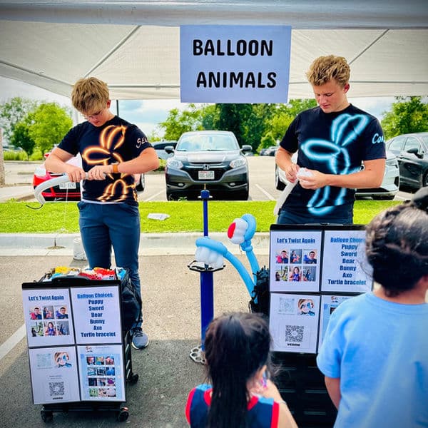 Balloon twisting at a birthday party