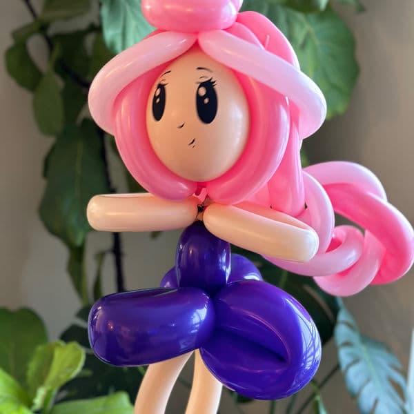 Balloon twisting at a Madison event